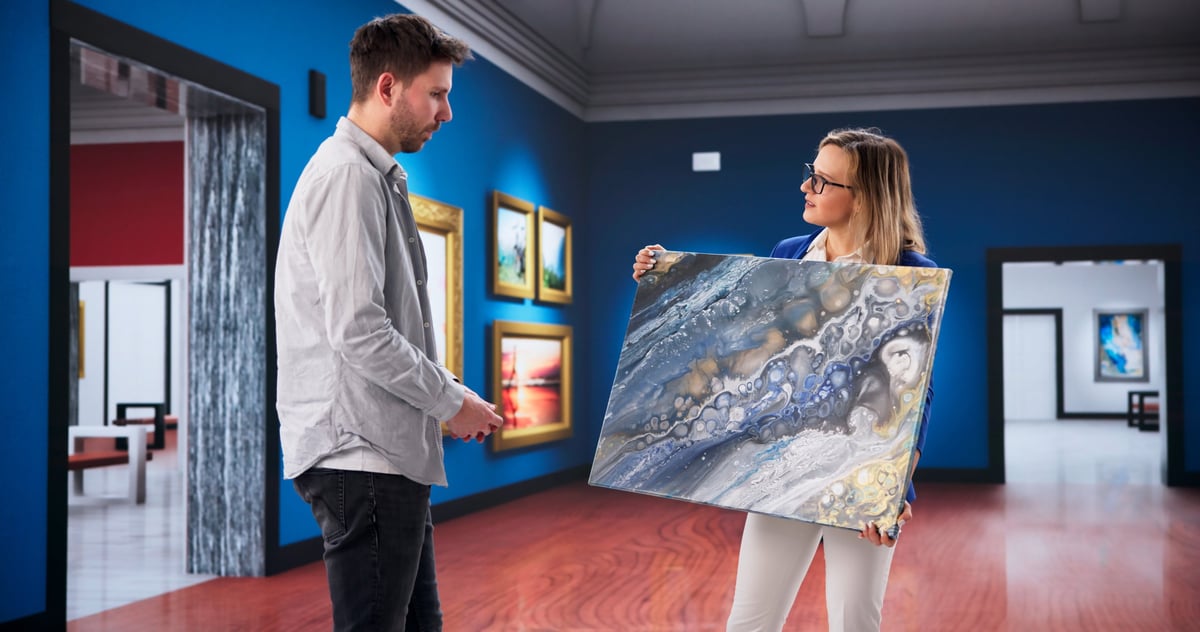 Gallery Consultant And Young Buyer Explore Contemporary Abstract Art Together